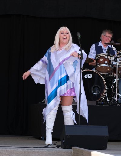 Ness as Agnetha and drummer Johnny Scott Caroline Bay Carnival December 2025